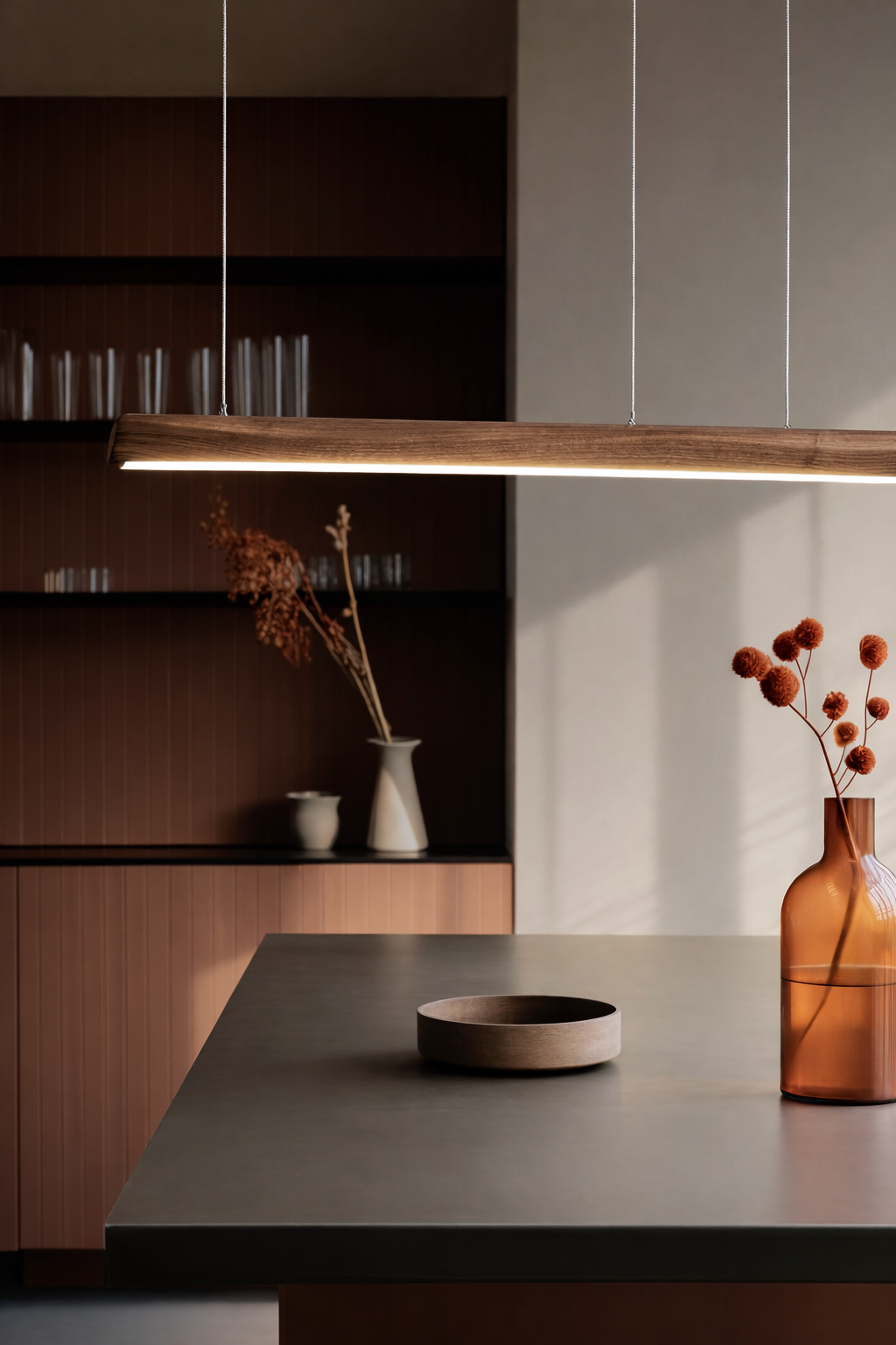 modern wooden LED pendant lamp hanging over dining table